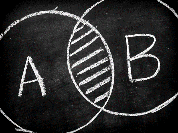 A Venn diagram labeled A and B drawn in chalk on a blackboard.