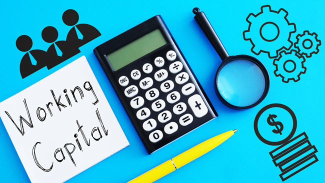 Illustration of a calculator, magnifying glass and coins beside a note reading Working Capital.