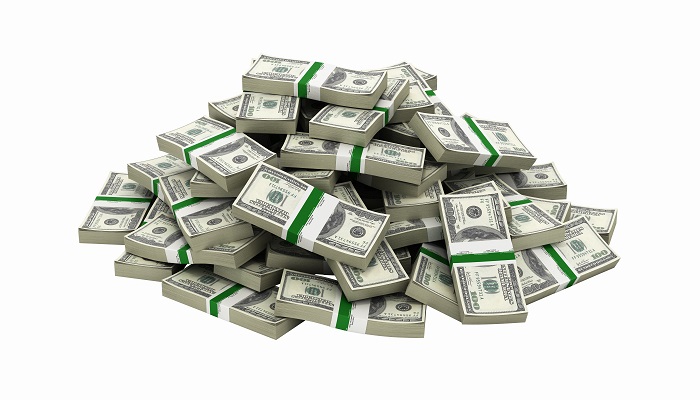 A pile of banded stacks of US hundred dollar bills.