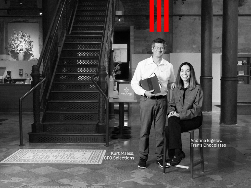 Fractional CFO Kurt Maass with Fran's Chocolates CEO Andrina Bigelow in the retail shop