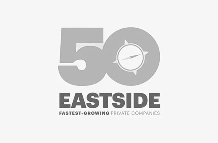 Eastside 50 Fastest-Growing Private Companies award logo, with a compass rose inside the number 50.