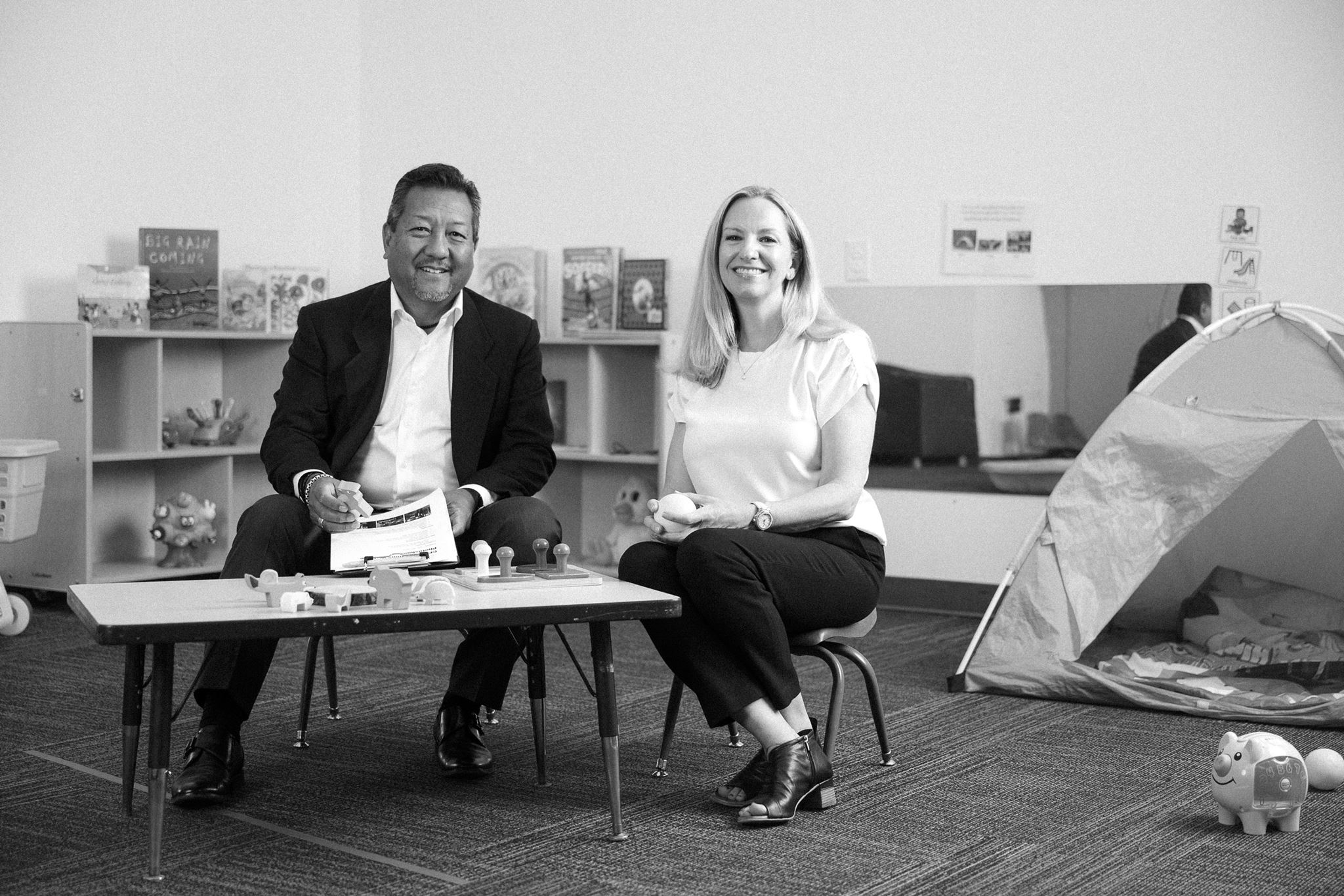 Fractional CFO Becky Todd and Kindering CFO Gary Yamamoto in a classroom