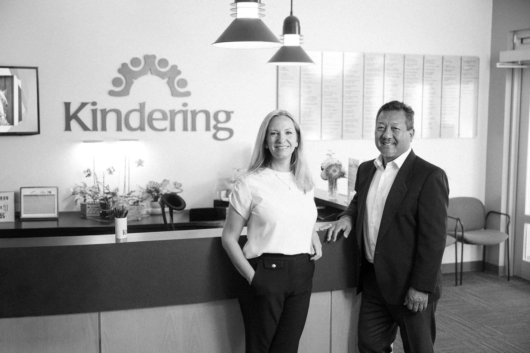 Becky Todd and Kindering CFO Gary Yamamoto at the Kindering reception desk